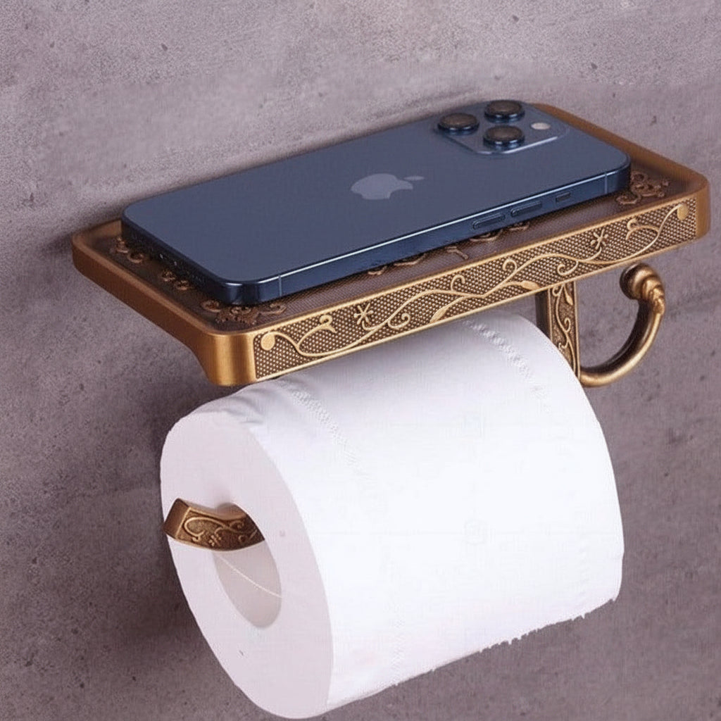 Decorative gold toilet paper holder with a smartphone on a gray background