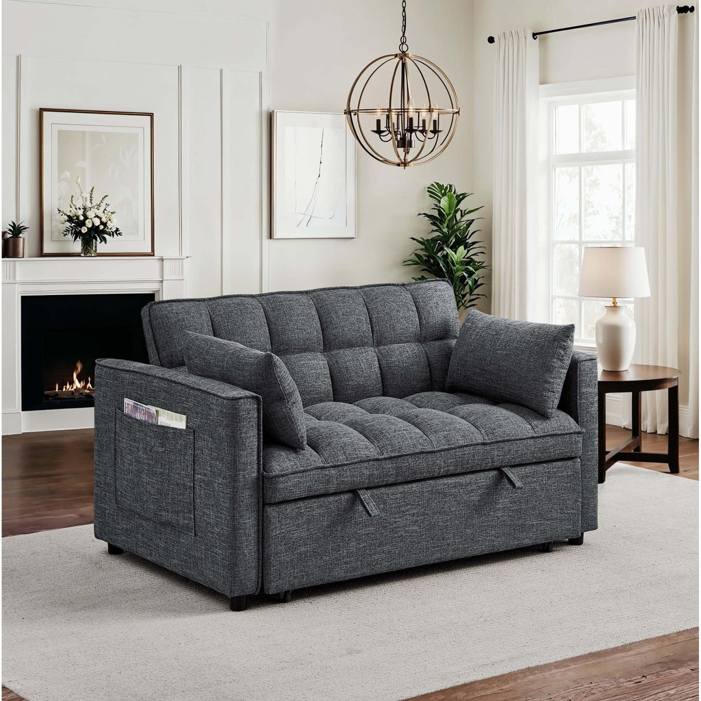 Gray sofa bed in a living room setting with a fireplace and decor.